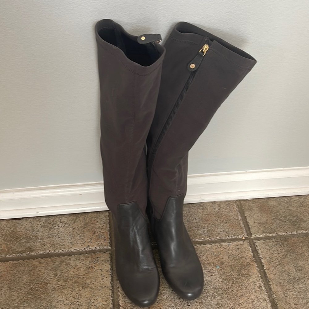 Barely worn, leather grey boots. Stretch to fit calf. Heel height about 2 inch